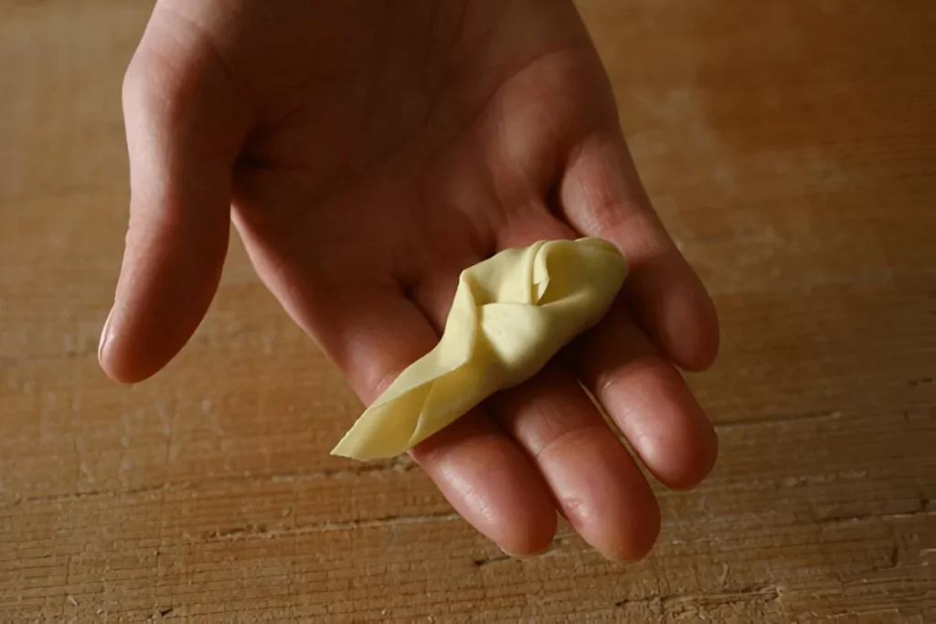 Tortelli Piacentini Ricetta Tradizionale: Il Gusto Autentico della Cucina Emiliana 6 Ripieno di ricotta e spinaci per tortelli piacentini